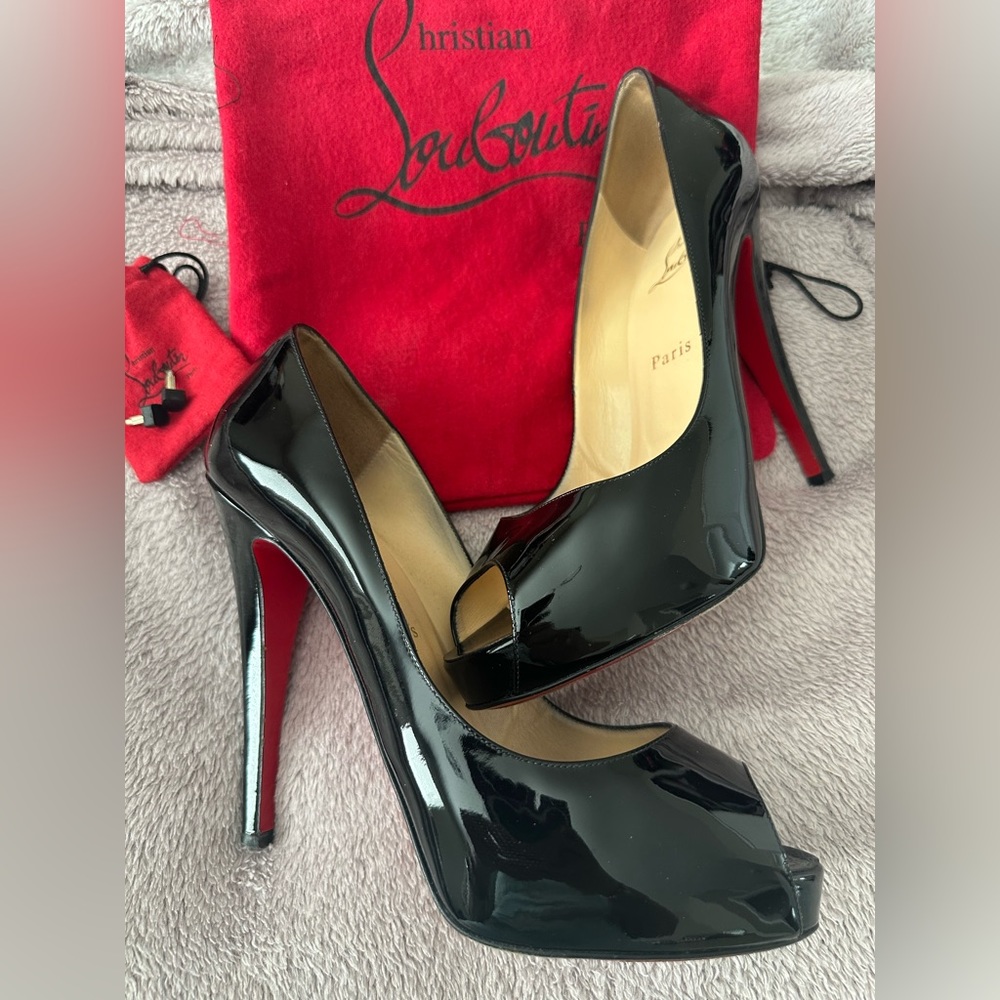 Used Louboutin peep toe heels size 40 1/2